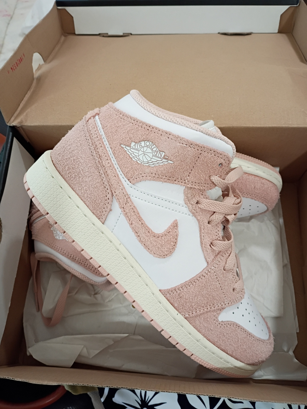 Jordan Women’s Mid Sneakers in Pink and White